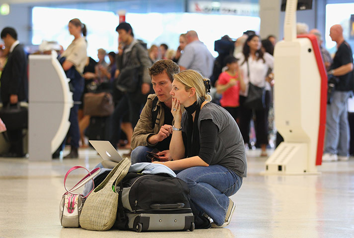 Qantas dispute: Passengers at the Qantas check in terminal in Melbourne, Australia
