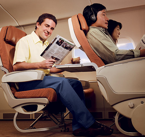 Singapore Airlines: Passengers reclining in economy seats