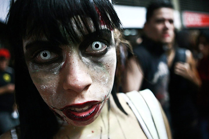 Halloween: Caracas, Venezuela: A woman dressed up as a zombie