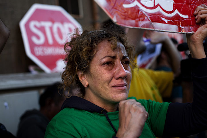 24 hours in pictures: protest to stop the eviction of a man who can't pay his mortage in spain