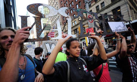 Occupy Wall Street demonstrators march to Foyle Square. Photograph ...