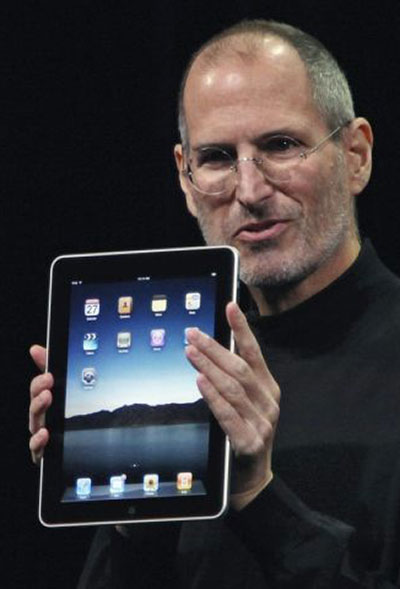 steve jobs dies: 27 January 2010: Jobs holds the Apple iPad at its San Francisco launch