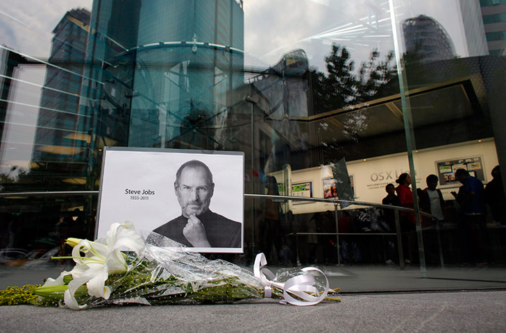 Steve Jobs Apple shrines: Shanghai, China: Flowers in memory of Jobs are seen outside an Apple Store