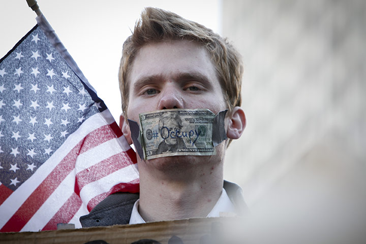 Wall Street Protests: A protestor during the Occupy Wall Street March