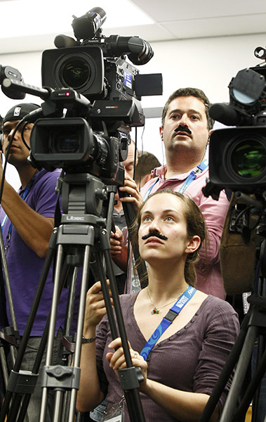 Best of the week in Sport: French media wear fake moustaches supporting France coach Marc Lievremont