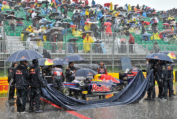 sport: Members of the Red Bull Racing team arri
