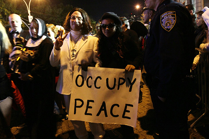 New York Halloween parade: Occupy protesters dressed as John Lennon and Yoko Ono