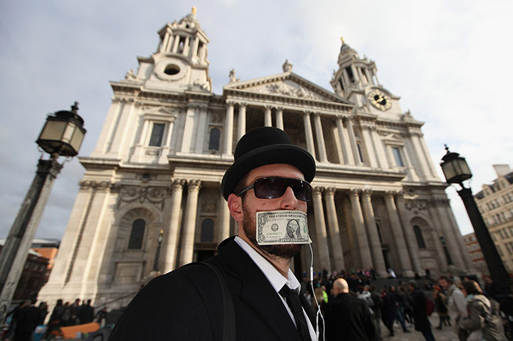 Week in Business: A protester demonstrates in the 'Occupy LSX' camp 