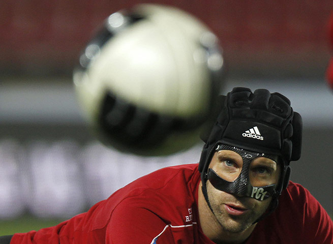The week in sport: Czech national soccer team player Petr Cech watches a ball during trianing