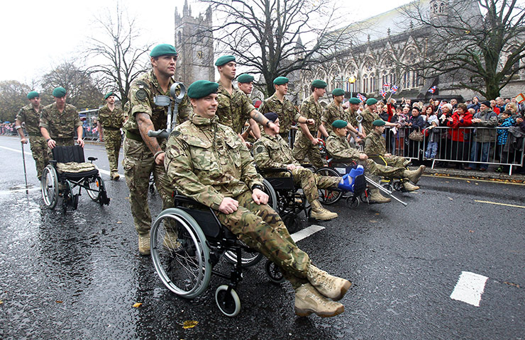Armistice day update: Injured and wounded Royal Marines march through Plymouth city centre