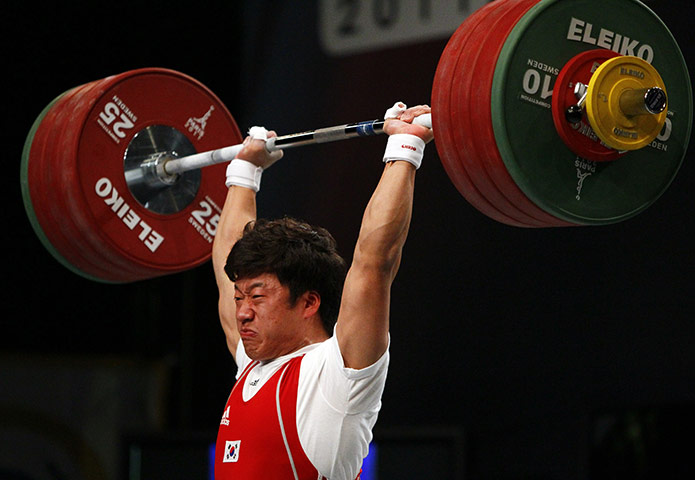 Weightlifting faces: China's Su Dajin- Men's 77kg weight class Clean and Jerk