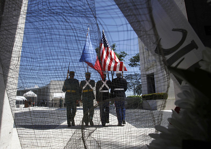 US Remembrance Day: hilippines and the U.S. are paraded during wreath-laying ceremony in Manila
