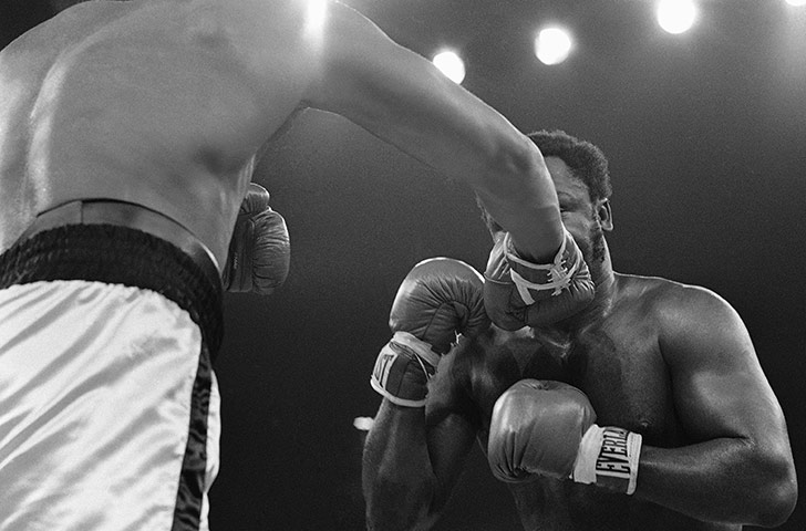 Thrilla in Manila: Muhammad Ali lands a right on Joe Frazier