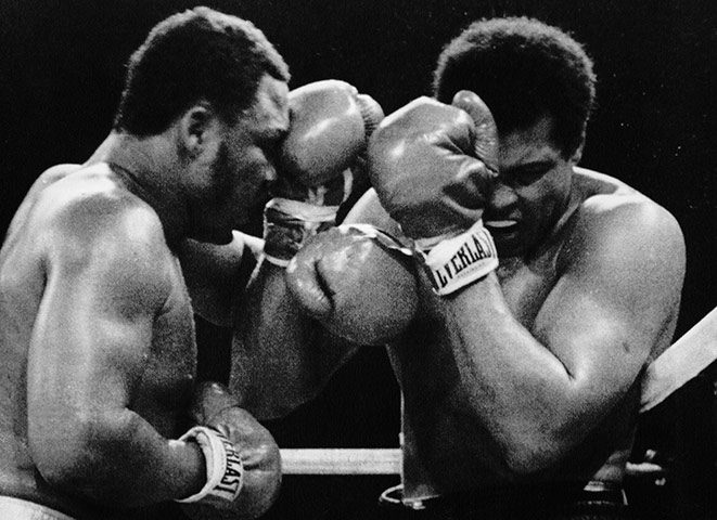 Thrilla in Manila: Muhammad Ali covers up as Joe Frazier punches