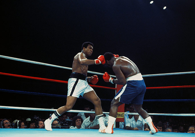 Thrilla in Manila: Muhammad Ali lands a right on the head of Joe Frazier