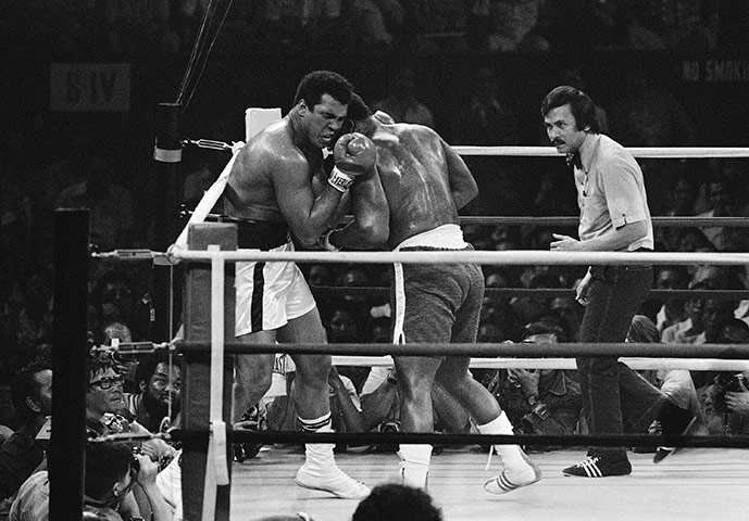 Thrilla in Manila: Muhammad Ali grimaces as he exchanges blows with Joe Frazier