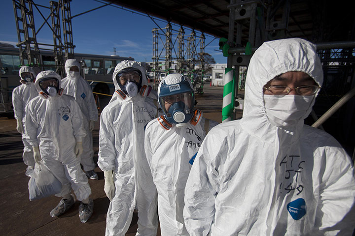 Inside Fukushima: Workers in protective suits