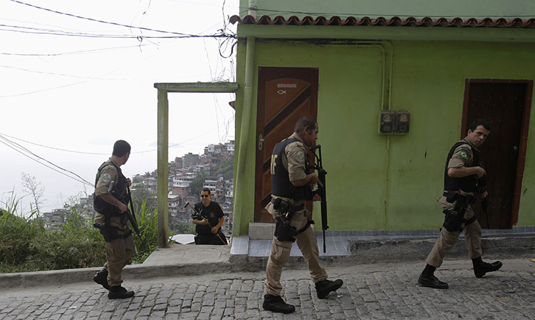 Rio raid: Brazilian Federal Police personnel patrol the Vidigal slum 