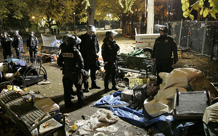 Occupy Portland: Police survey damage and debris left in the parks