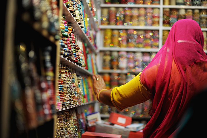 24 hours in pictures: A woman shops for popular Indian handmade jewellery