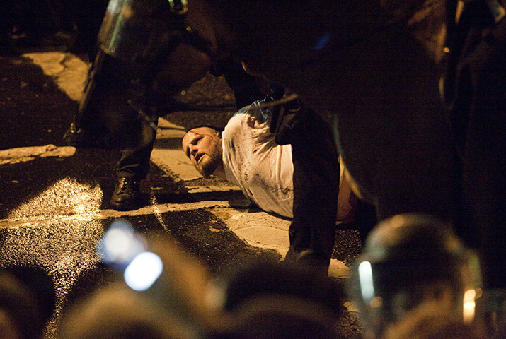 24 hours in pictures:  A man is arrested at Occupy Portland encampment