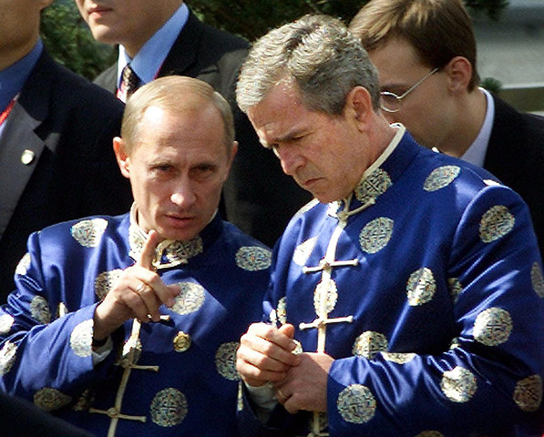 APEC Summit: 21 October 2001: Vladimir Putin chats with George Bush