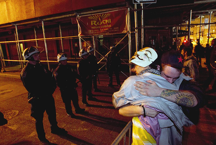 occupy wall street: Occupy Wall St activists console each other after being removed 
