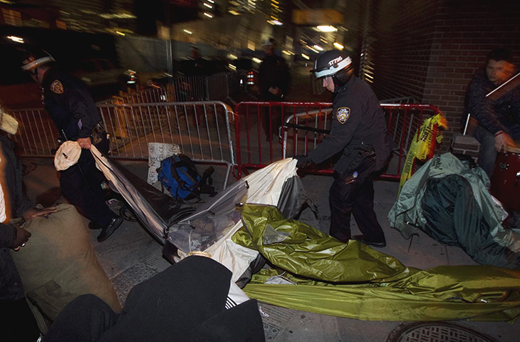 occupy wall street: NYPD officers remove members of the movement from Zuccotti Park in New York