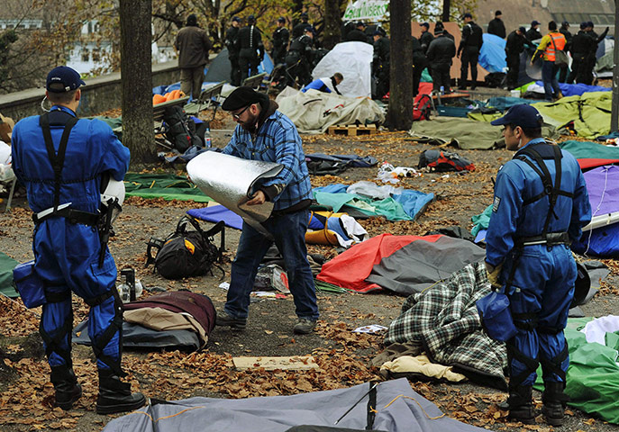 Occupy protest evictions: Zurich, Switzerland: Police clear Lindenhof square