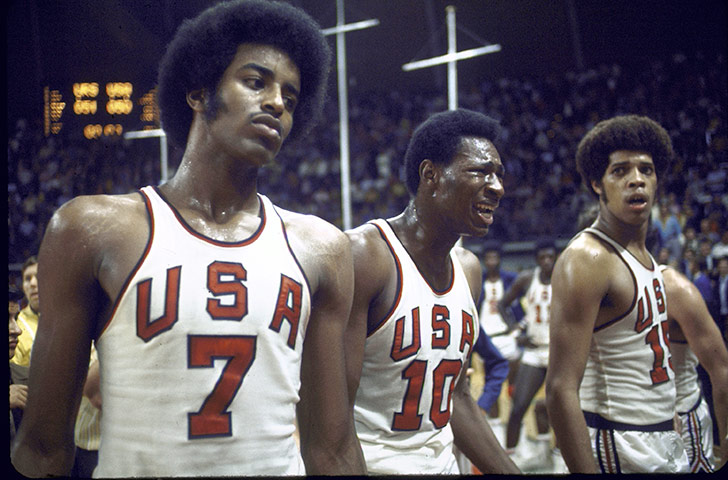 basketball4: A stunned US basketball team after they