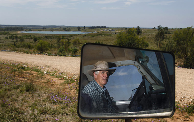 From the agencies: Farmer Scott Wason looks at a Santos coal-seam gas water treatment