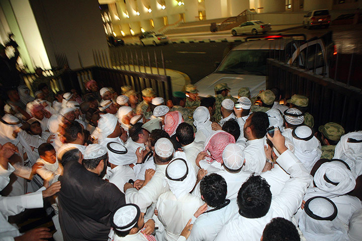 kuwait protests: Demonstrators break open the gate as they storm the national assembly