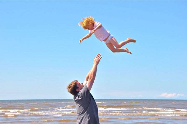 In pictures: Height: Man catching daughter