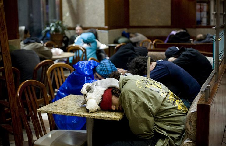 24 hours in pictures: Occupy Wall Street protesters sleep in a McDonalds near Zuccotti Park