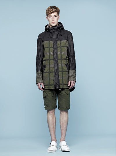 Skateboarding Fashion: man in anorak and camouflage shorts