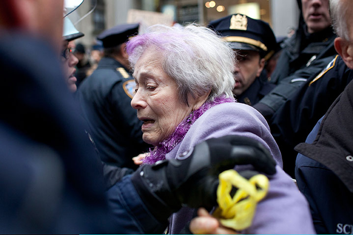 Occupy Day of Action: Elderly woman is pushed by police in New York's Financial District