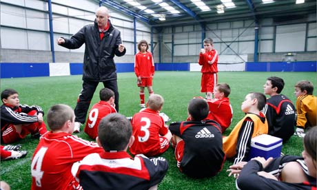 Teams of children compete in the Festival of Football 