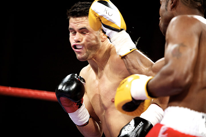 Liam Walsh: Liam Walsh's face shudders after being caught by a big right from Frontin