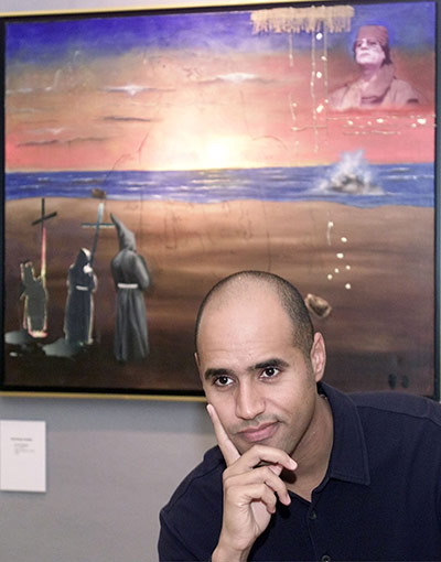 Saif al-Islam Gaddafi: Saif El-Islam Gaddafi in fron of his painting 'the challenge'