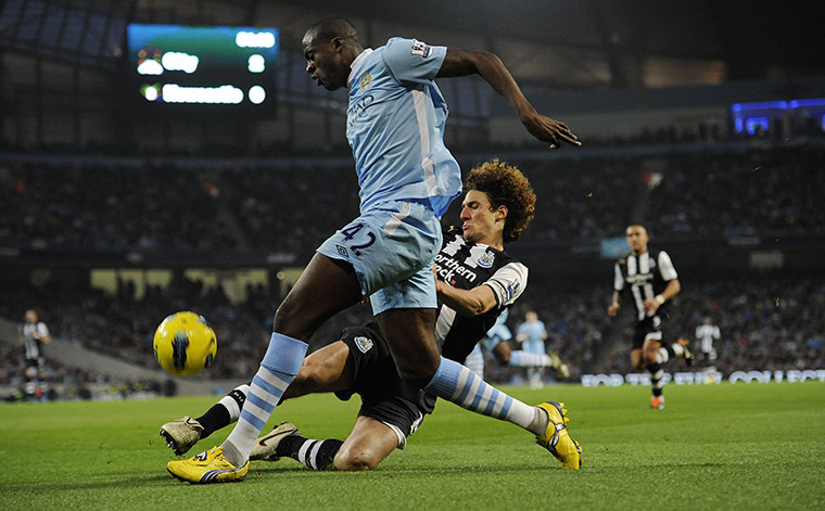 Man City v Newcastle: Yaya Toure and Fabricio Coloccini