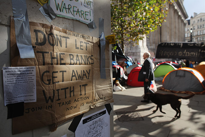 Signs at Occupy London: don't let the bankers get away with it