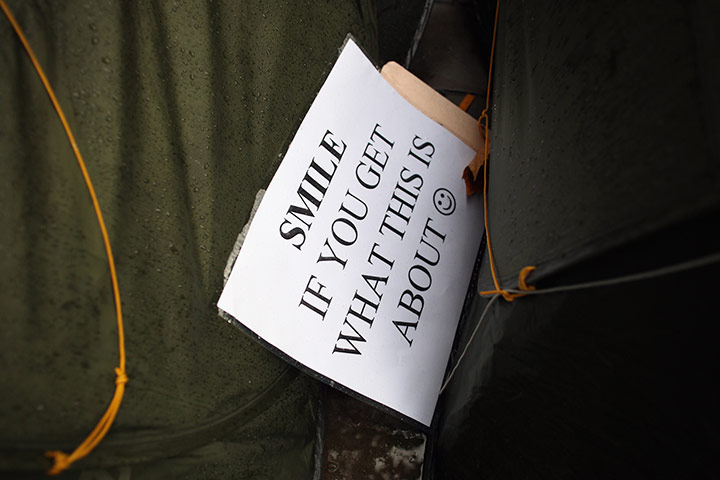 Signs at Occupy London: smile