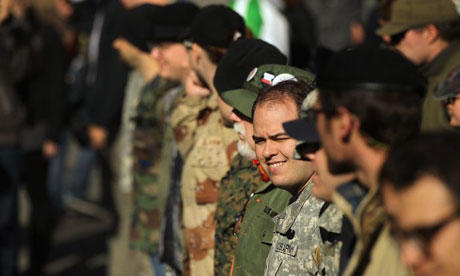 Anti-war Iraq veterans march to Occupy Wall Street's camp at Zucotti Park in New York