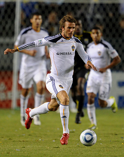 beckham3: David Beckham controls the ball upon his