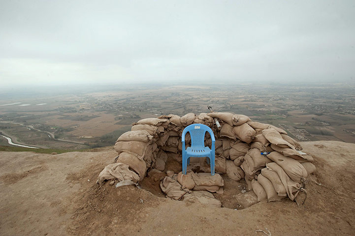 24 hours in pictures: Pol-e Khomri, Afghanistan: Unoccupied chair at an Afghan observation post