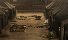 Iraqi detainees sleep outside tents in the Camp Bucca detention centre