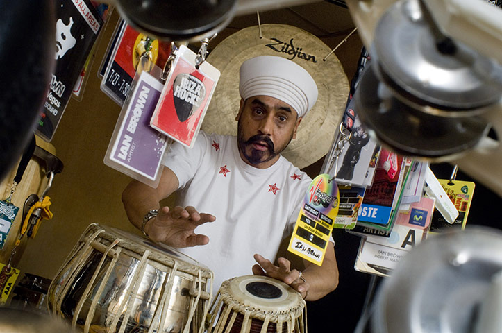 Making Britain: Inder Goldfinger playing tabla at a sound studio in Harehills, Leeds