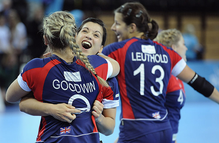 Handball: Holly Lam-Moores hugs fellow goalscorer Britt Goodwin
