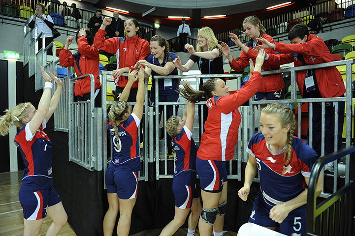 Handball: The GB team celebrate their victory with other squad members