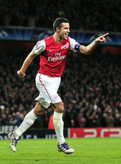 Wed Champions League: Robin van Persie celebrates after scoring against Borussia Dortmund